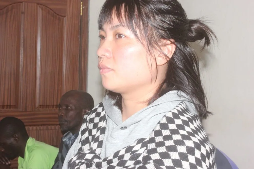 Chinese national Chen Yun charged at Kibera Law Courts for allegedly defrauding a Kenyan investor of Sh20 million in a fake construction company sale.