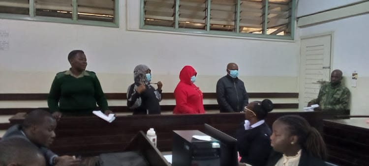 Four suspects charged at Kibera Law Courts for defrauding a Kenyan woman of Sh19 million in a fake currency and consignment clearance scam.
