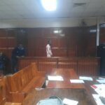 Lewis Murai Njuguna appears at the Milimani Law Courts in Nairobi accused of impersonating a Senior Superintendent of Police at Green Park Police Post.