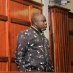 Stephen Hiuhu Ngigi in court charged with forging AMACO comprehensive insurance certificate for vehicle KDB 014T.