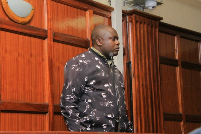Stephen Hiuhu Ngigi in court charged with forging AMACO comprehensive insurance certificate for vehicle KDB 014T.