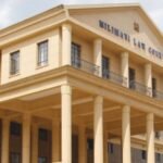“Mwingi West aspirant Jonathan Ngenga Ndisya at Milimani Law Courts over Sh102 million fraud case.”