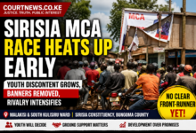 Sirisia MCA race campaign scene in Malakisi showing youth at boda boda stage and removed political banners in Bungoma County