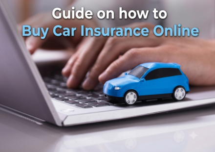 Driver using a laptop to buy car insurance online